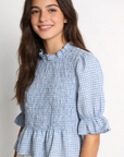 blouse à carreaux bleu clair détail matière texturée