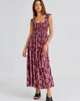 Robe fleurie smockée à bretelles volantées vue de profil