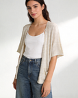 veste maille brillante beige portée