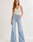 02. Jean flare clouté à poches plaquées