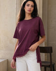 02. Top en jersey à ourlet dentelle asymétrique