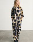 Pantalones anchos para mujer con estampado moderno, cintura elástica cómoda y estilo chic.