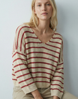 Pull court femme en maille torsadée col V style cropped