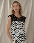 Blouse à pois et dentelle