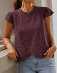 blouse prune portée croisée à clous