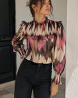 blouse imprimée col montant volants