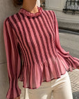 Blouse peplum rayée col volanté
