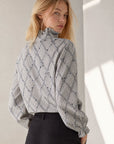 Blouse vichy plumetis à col montant volanté