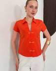 top13857 chemise orange elegante avec boutons buchettes image 1