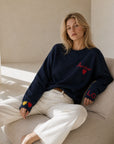 Pull en maille bleu nuit dos cœur