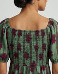 robe verte détail dos smocké