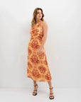 Robe longue dos nu orange imprimée chic avec robe halter-midi à motif paisley