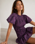 Détail des smocks robe violette