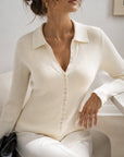 Cardigan beige assis col V