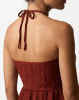détail bretelles perles rouge carmin
