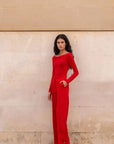 Jumpsuit rouge à épaules dénudées manches longues avec jambes larges et détail bouton