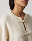 Cardigan détail brandebourgs écru
