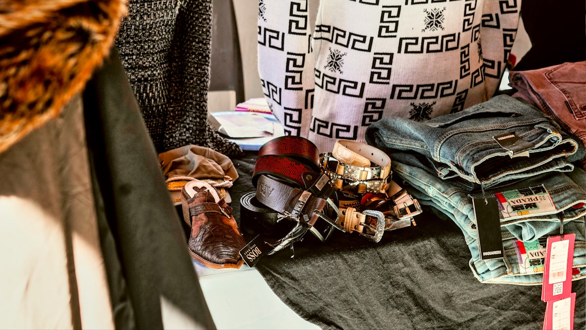 A pile of clothes sitting on top of a table