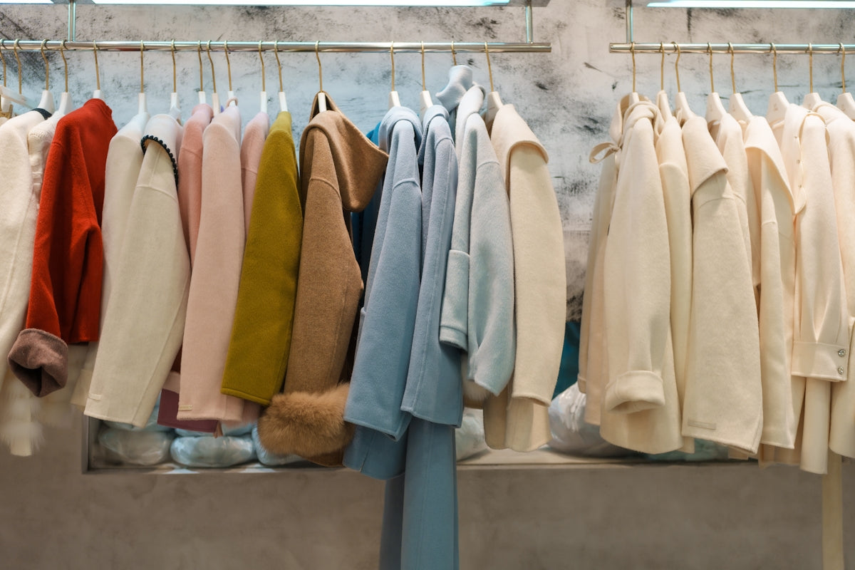 A rack of clothes hanging on a rail