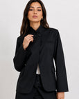 veste noire profil poches à rabat