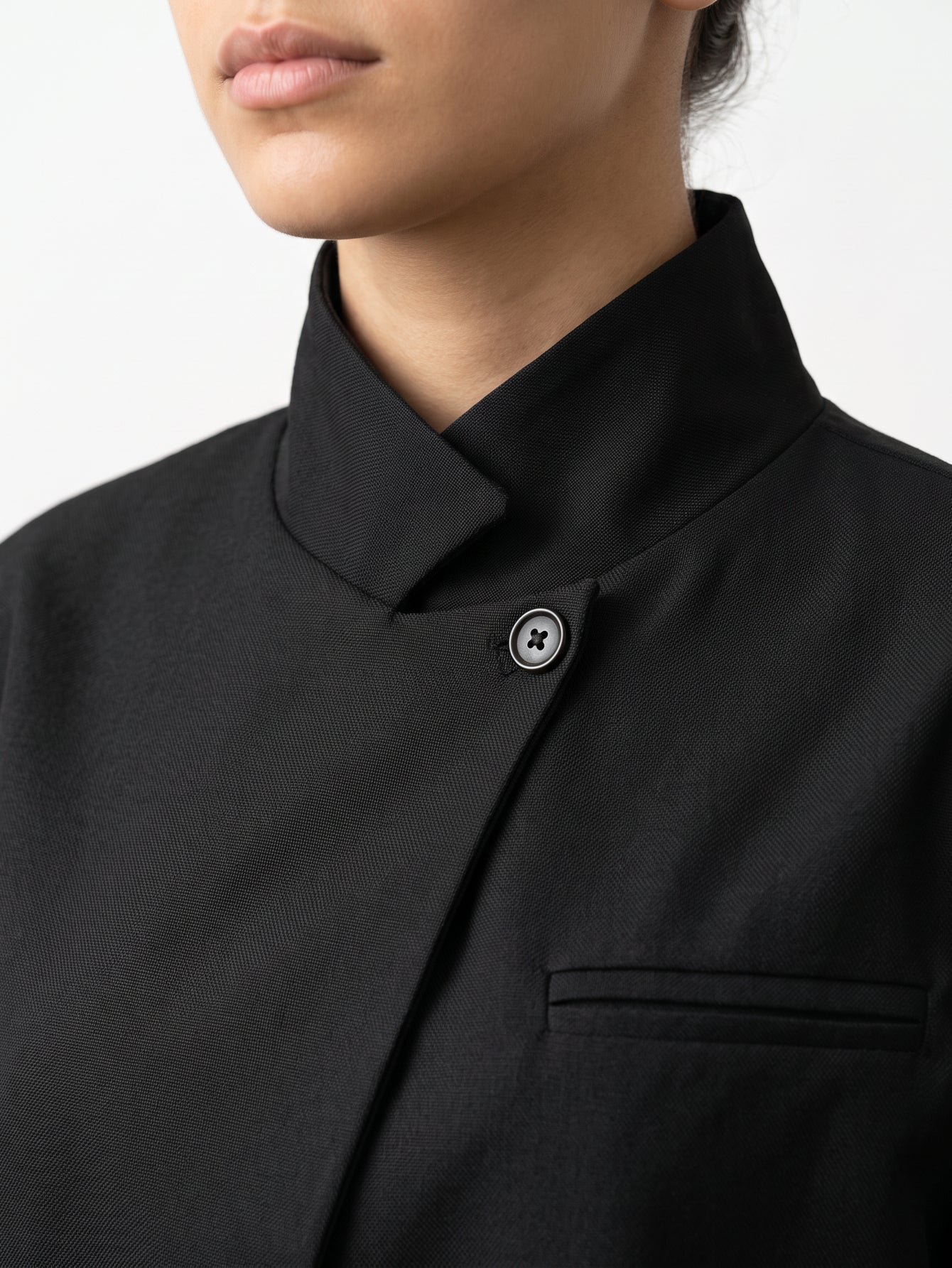 veste noire détail dos col officier