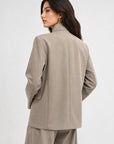 veste kaki détail bouton col