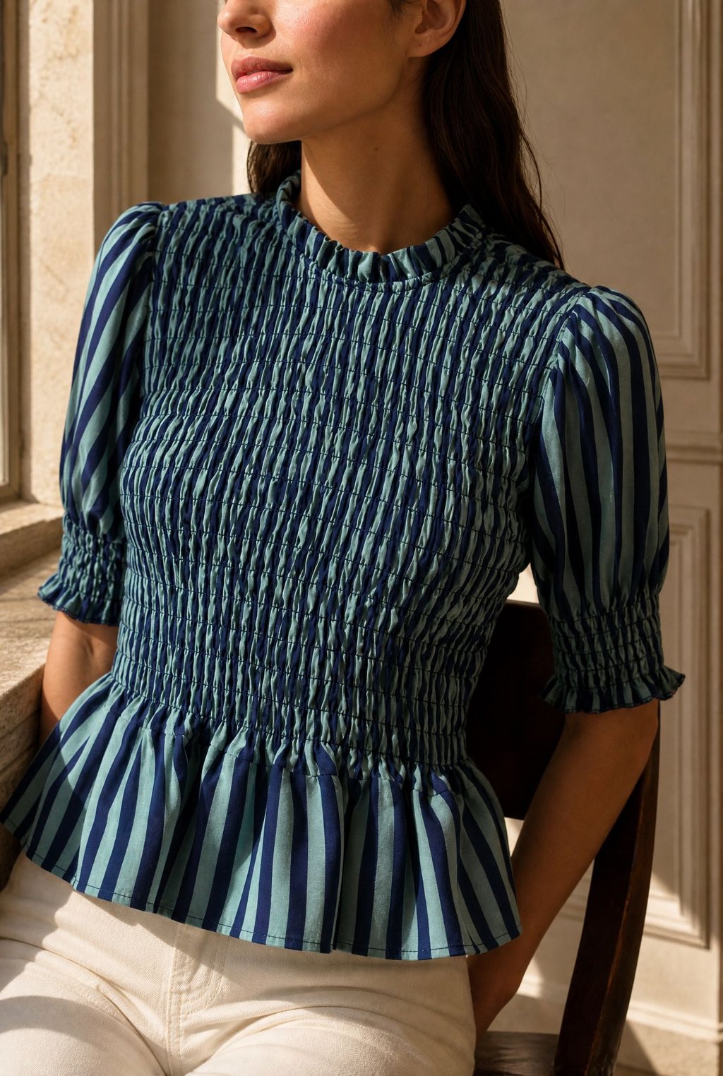  Blouse péplum smockée à col volanté