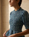 02. Blouse péplum smockée à col volanté
