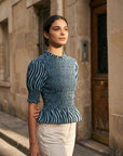 02. Blouse péplum smockée à col volanté