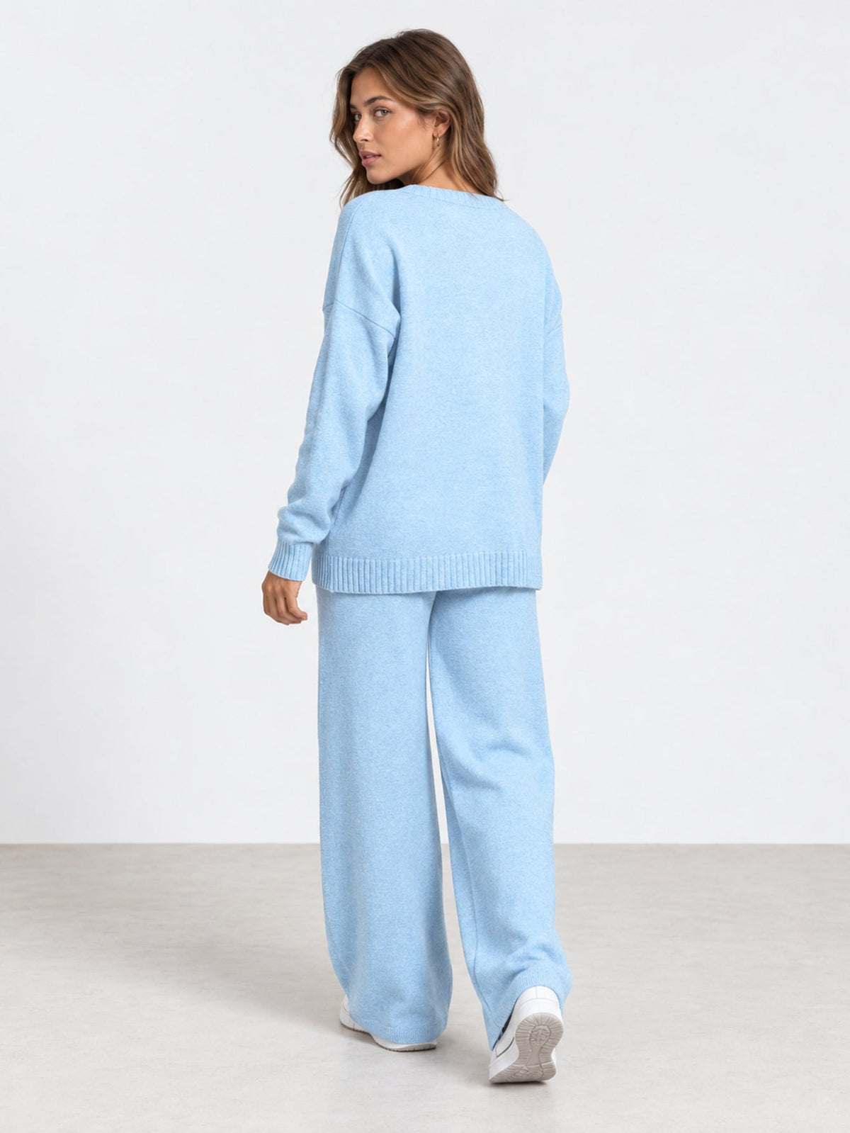 Dos ensemble en maille bleu clair