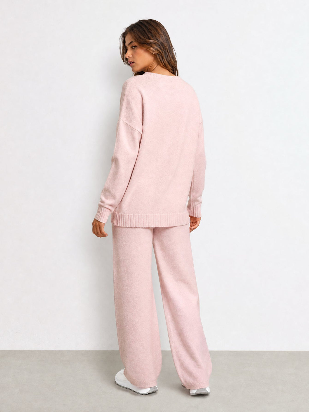 Dos ensemble en maille rose poudré