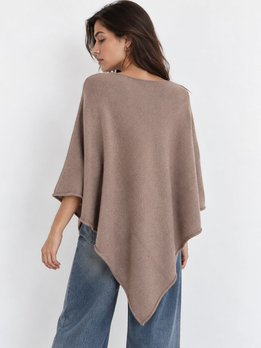 Dos du poncho en maille taupe