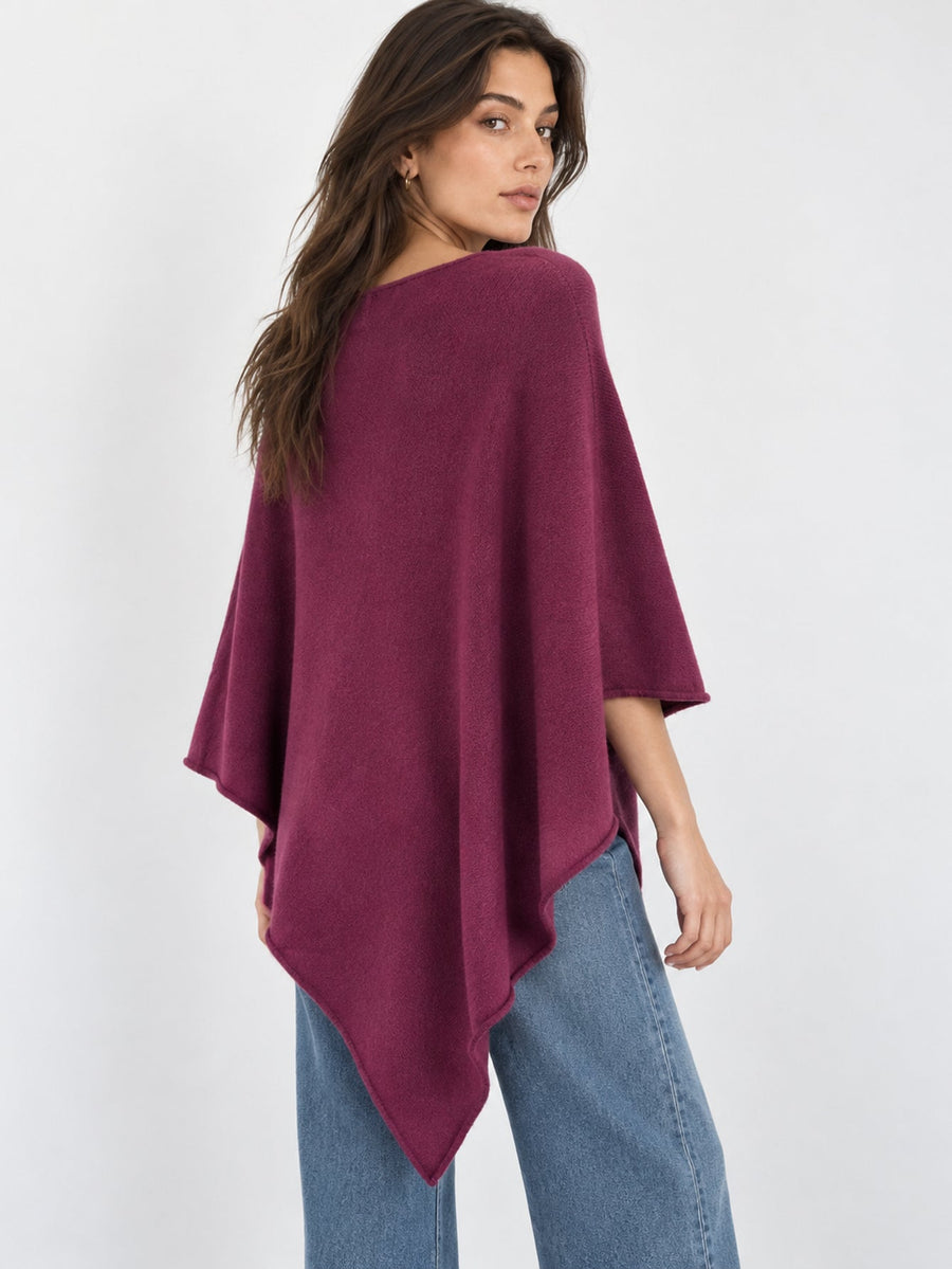 Dos du poncho en maille prune