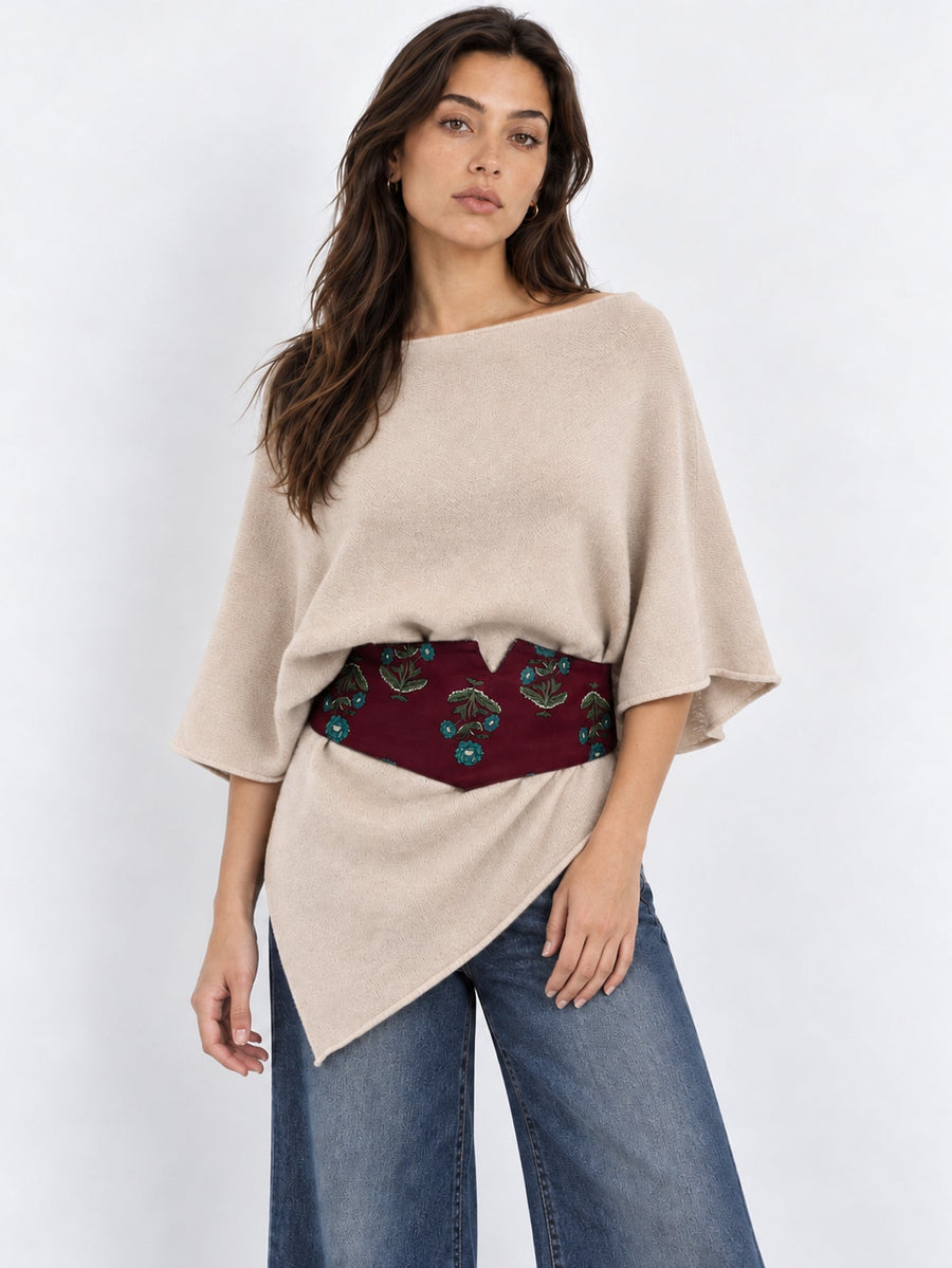 Poncho en maille beige avec ceinture