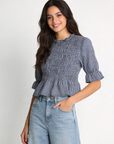 blouse à carreaux bleue et jean casual teen