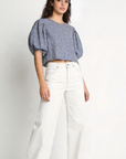blouse à carreaux col rond détail tissu