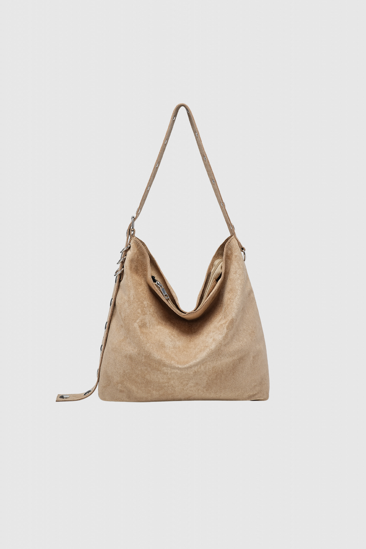 Sac à main simili cuir femme en couleur crème, parfait pour ajouter une touche chic à votre tenue.