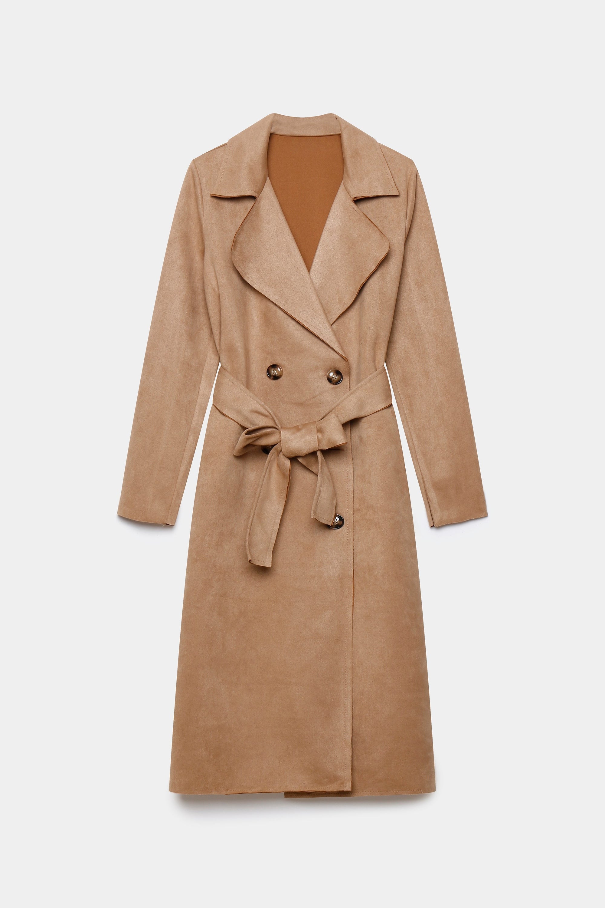 Trench femme ceinture beige clair, élégant et fluide, parfait pour un look printanier.
