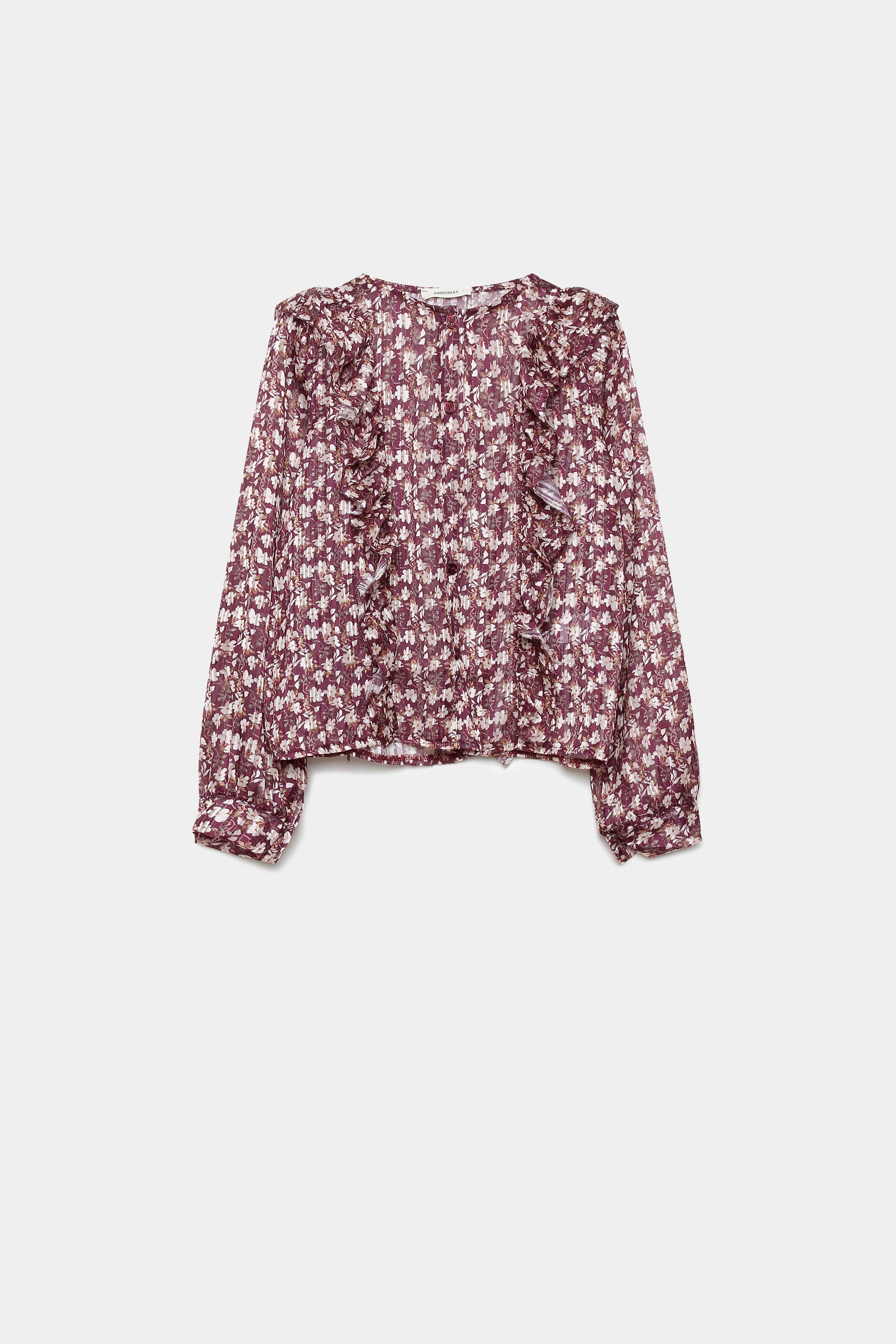 Blouse fluide imprimé floral brillante en teinte bordeaux, exposée sur fond blanc pour mettre en avant son design.
