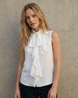 Chemisier blanc lisse volants sans manches