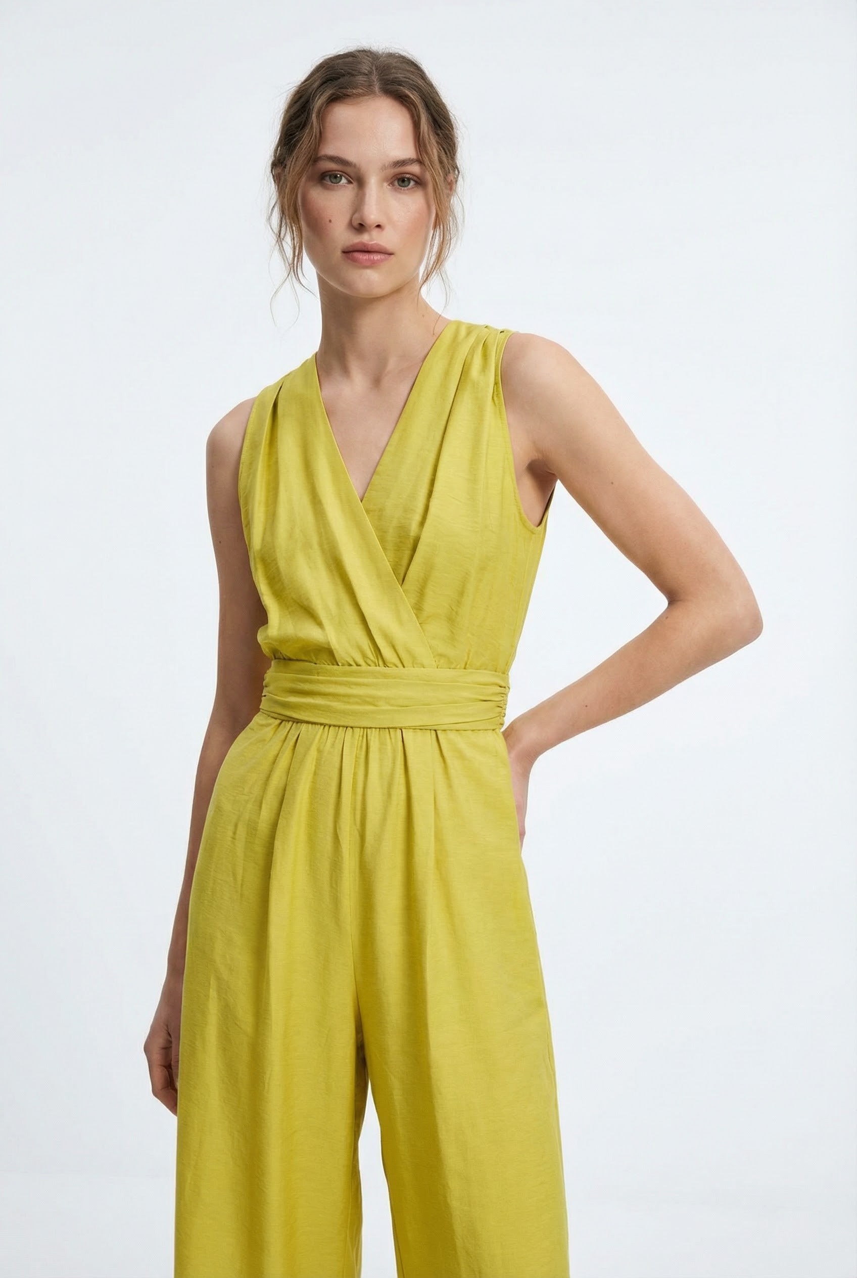 💛 Women's summer pistachio-colored fluid jumpsuit - chic, lightweight and crossed back