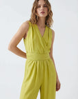 💛 Women's summer pistachio-colored fluid jumpsuit - chic, lightweight and crossed back