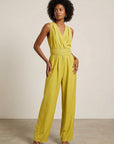 💛 Women's summer pistachio-colored fluid jumpsuit - chic, lightweight and crossed back