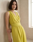 💛 Women's summer pistachio-colored fluid jumpsuit - chic, lightweight and crossed back