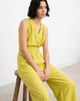 💛 Women's summer pistachio-colored fluid jumpsuit - chic, lightweight and crossed back