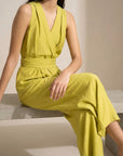 💛 Women's summer pistachio-colored fluid jumpsuit - chic, lightweight and crossed back