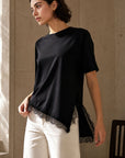 02. Top en jersey à ourlet dentelle asymétrique