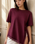 02. Top en jersey à ourlet dentelle asymétrique