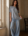 02. Top en jersey à ourlet dentelle asymétrique