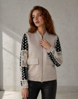 02. Veste beige zippée manches dentelle poches à rabat